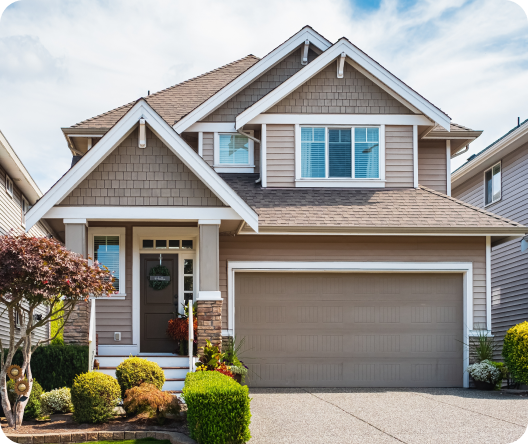 Beautiful house with garage and well-maintained front lawn